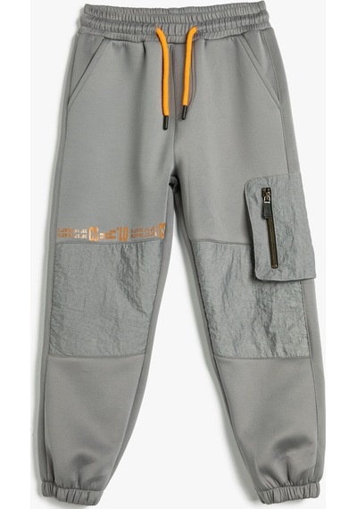 Koton Jogger Eşofman Altı Beli Bağlamalı Cepli Paraşüt Kumaş Detaylı Gri 4wkb40167tk 4WKB40167TK042 Gri