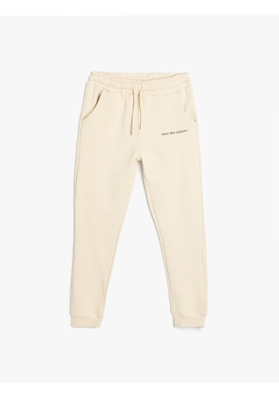 Koton Jogger Eşofman Altı Slogan Baskılı Cepli Beli Bağlamalı Bej 5wkb40175tk Ekru
