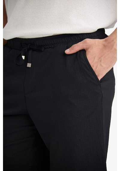 DeFacto Regular Fit Her Yöne Esneyen Krinkıl Bermuda Şort - E0980AX25SMBK81 DeFacto Regular Fit Her Yöne Esneyen Krinkıl Bermuda Şort - E0980AX25SMBK81