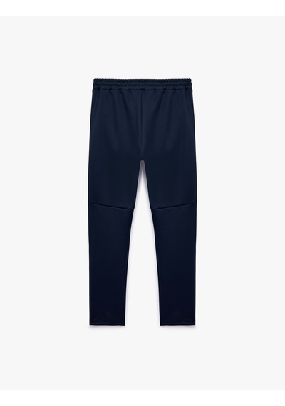 Koton Scuba Kumaş Cepli Biyeli Straight Fit Beli Lastikli Bağcıklı Spor Eşofman Altı Lacivert 7wam40022nk Koton Scuba Kumaş Cepli Biyeli Straight Fit Beli Lastikli Bağcıklı Spor Eşofman Altı Lacivert 7wam40022nk