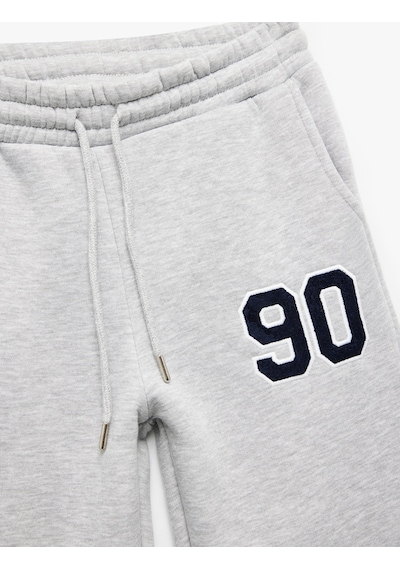 Koton Üç İplik Şardonlu Nakışlı Cepli Jogger Spor Eşofman Altı Gri Melanj 7wak40061nk Koton Üç İplik Şardonlu Nakışlı Cepli Jogger Spor Eşofman Altı Gri Melanj 7wak40061nk