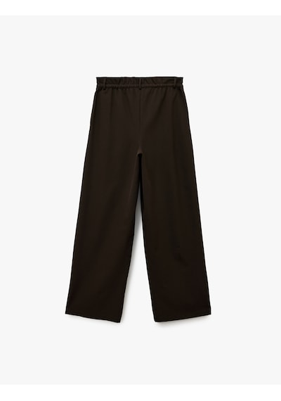 Koton Beli Bağcıklı Bağlamalı Cepli Düz Geniş Paça Kumaş Pantolon Kahverengi 6wak40188pw Kahve Koton Beli Bağcıklı Bağlamalı Cepli Düz Geniş Paça Kumaş Pantolon Kahverengi 6wak40188pw Kahve
