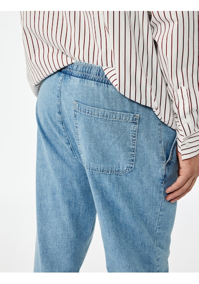 Koton Pamuklu Cep Detaylı Beli Bağcıklı Bol Kalıp Jean Pantolon Açık İndigo 6wam40116nd Açık İndigo Koton Pamuklu Cep Detaylı Beli Bağcıklı Bol Kalıp Jean Pantolon Açık İndigo 6wam40116nd Açık İndigo