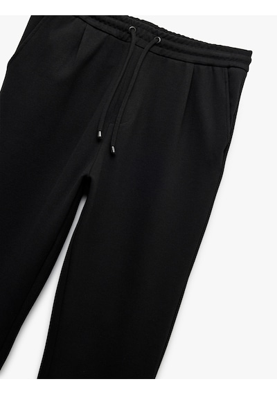 Koton Beli Bağcıklı Cepli Katlamalı Paça Pantolon Görünümlü Eşofman Altı Siyah 6wam40017mk Siyah Koton Beli Bağcıklı Cepli Katlamalı Paça Pantolon Görünümlü Eşofman Altı Siyah 6wam40017mk Siyah