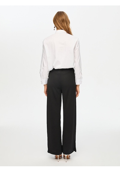 Faik Sönmez Beli Lastikli Triko Görünümlü Wide Leg Fit Pantolon S26pnt032 Us26pnt03210 Siyah Faik Sönmez Beli Lastikli Triko Görünümlü Wide Leg Fit Pantolon S26pnt032 Us26pnt03210 Siyah