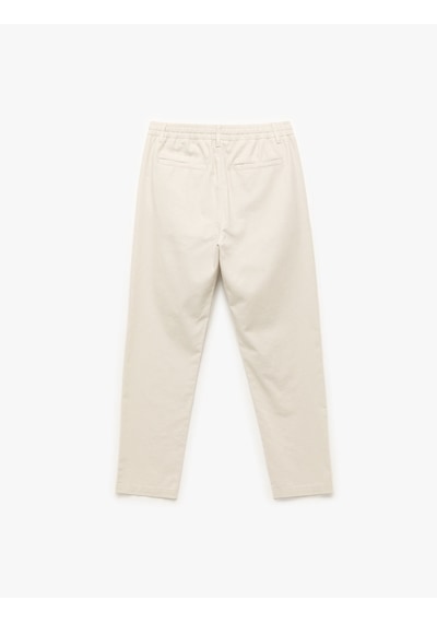 Koton Beli Bağcıklı Cep Detaylı Düğmeli Pileli Keten Pamuk Karışımlı Chino Pantolon Bej 5sam40182hw Ekru