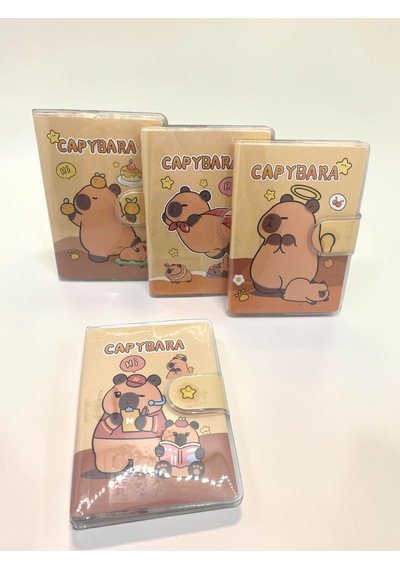 Capybara A7 Not Defteri , Çıt Çıtlı Cep Defteri - Kitap Okuyan Capybara Sarı