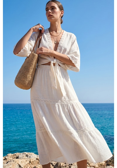 Fashion Cocktail Romantik Fisto İşlemeli V Yaka Önden Bağlamalı Crop Bluz Ve Kat Kat Fırfırlı Etek Seti Tiril Tiril Şile Bezi Görünümlü Müslin Etnik Bohem İkili Takım ekru Fashion Cocktail Romantik Fisto İşlemeli V Yaka Önden Bağlamalı Crop Bluz Ve Kat Kat Fırfırlı Etek Seti Tiril Tiril Şile Bezi Görünümlü Müslin Etnik Bohem İkili Takım ekru
