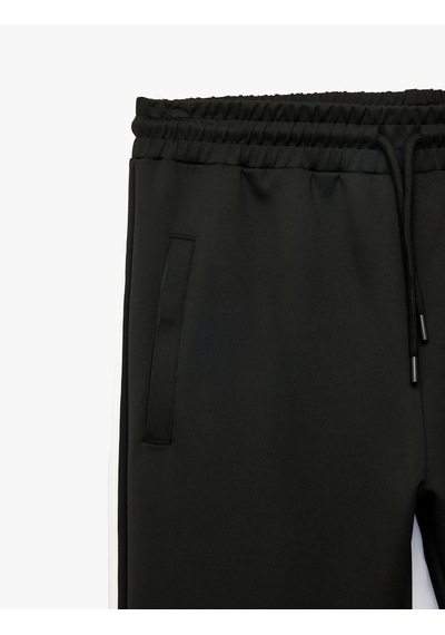 Koton Scuba Kumaş Cepli Biyeli Beli Bağcıklı Eşofman Altı Siyah 7wam40036nk