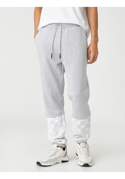 Koton Basic Jogger Eşofman Altı Beli Bağcıklı Çiçek Baskılı Gri 3sam40038mk 3SAM40038MK031 Gri Koton Basic Jogger Eşofman Altı Beli Bağcıklı Çiçek Baskılı Gri 3sam40038mk 3SAM40038MK031 Gri
