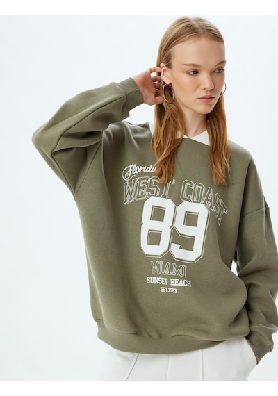 Koton Polo Yaka Sweatshirt Oversize Slogan Baskılı Şardonlu Haki 5wal10174ık Haki