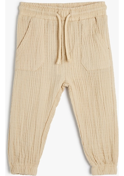 Koton Jogger Pantolon Cep Detaylı Beli Lastikli Dokulu Bej 4smb40011tw 4SMB40011TW054 Ekru