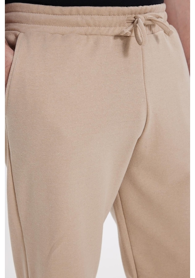 Tudors Erkek Regular Fit Klasik Kesim Beli Bağcıklı Jogger Cepli Lastikli Paça Bej Eşofman Altı-41767 Bej Tudors Erkek Regular Fit Klasik Kesim Beli Bağcıklı Jogger Cepli Lastikli Paça Bej Eşofman Altı-41767 Bej
