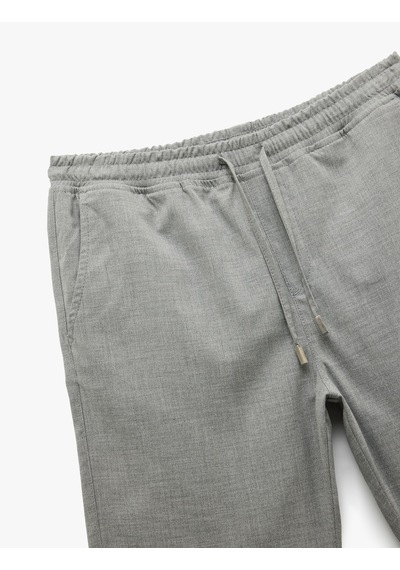 Koton Viskon Karışımlı Cep Detaylı Bermuda Slim Fit Beli Bağcıklı Şort Gri 5sam40017hw Gri