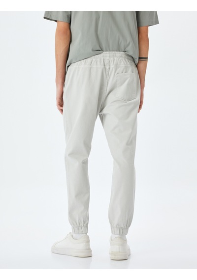 Koton Kanvas Pamuklu Beli Bağcıklı Chino Cep Detaylı Jogger Pantolon Gri 5sam40008hw Gri Koton Kanvas Pamuklu Beli Bağcıklı Chino Cep Detaylı Jogger Pantolon Gri 5sam40008hw Gri