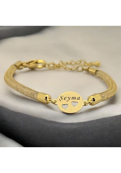Şeyma Yazılı Kalp Detaylı Oval Motifli 14 Ayar Altın Plakalı Hasır Kordonlu Hediye Bileklik-508isim Şeyma Şeyma Yazılı Kalp Detaylı Oval Motifli 14 Ayar Altın Plakalı Hasır Kordonlu Hediye Bileklik-508isim Şeyma