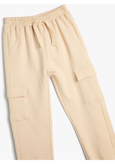 Koton Basic Kargo Jogger Eşofman Altı Cepli Beli Lastikli Bej 4wmg40161ak 4WMG40161AK050 Ekru Koton Basic Kargo Jogger Eşofman Altı Cepli Beli Lastikli Bej 4wmg40161ak 4WMG40161AK050 Ekru