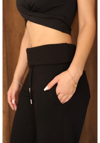 Ozy Fashion Kadın Beli Katlamalı Lastikli Bol Paça Stoper Detaylı 3 İplik Kışlık Eşofman Altı Siyah Ozy Fashion Kadın Beli Katlamalı Lastikli Bol Paça Stoper Detaylı 3 İplik Kışlık Eşofman Altı Siyah