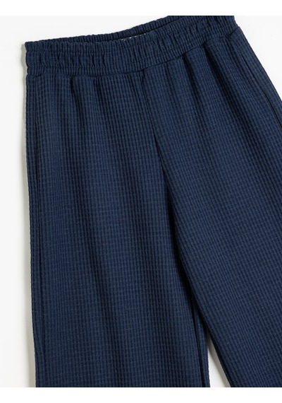 Koton Bol Paça Pantolon Rahat Kesim Beli Lastikli Dokulu Lacivert 5wkg40151ak Lacivert