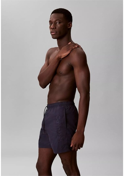 Calvin Klein Erkek Beli Lastikli Ve İp Bağlamalı Logo Detaylı Normal Kesim Lacivert Deniz Şortu-15869 Calvin Klein Erkek Beli Lastikli Ve İp Bağlamalı Logo Detaylı Normal Kesim Lacivert Deniz Şortu-15869