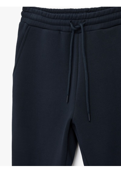 Koton Lastikli Paça Cepli Şardonlu Beli Bağcıklı Jogger Spor Eşofman Altı Lacivert 6sam40069nk Koton Lastikli Paça Cepli Şardonlu Beli Bağcıklı Jogger Spor Eşofman Altı Lacivert 6sam40069nk