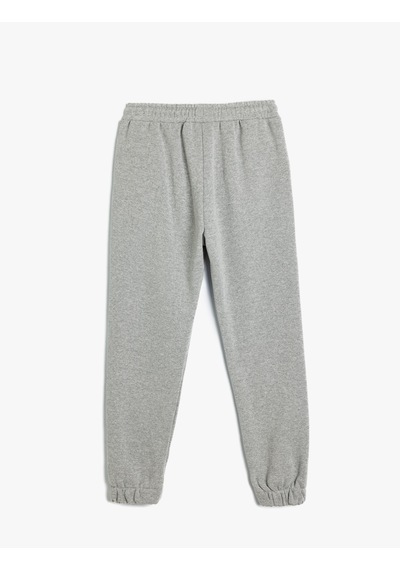Koton Jogger Eşofman Altı Baskı Detaylı Beli Bağlamalı Cepli Şardonlu Gri 5wkb40088tk Gümüş Rengi Gümüş