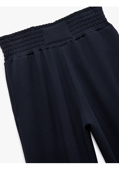 Koton Beli Lastikli Yüksek Bel Cepli Rahat Kalıp Jogger Eşofman Altı Lacivert 6wal40022ık Lacivert