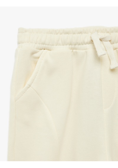 Koton Cep Detaylı Lastikli Oversize Jogger Eşofman Altı Ekru 7wmb40044tk