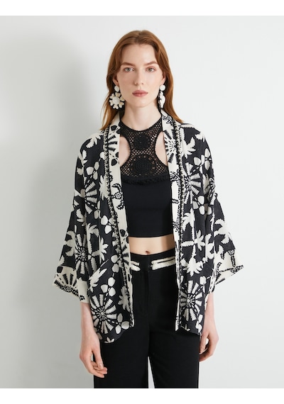 Koton Oversize Kimono Viskon Keten Karışımlı Yarım Kollu Cepli Siyah Desenli 4sak50030ew Beyaz - Siyah Koton Oversize Kimono Viskon Keten Karışımlı Yarım Kollu Cepli Siyah Desenli 4sak50030ew Beyaz - Siyah