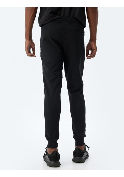 Koton Spor Eşofman Altı Jogger Beli Bağcıklı Dikiş Detaylı Cepli Pamuk Karışımlı Siyah 5wam40095nk Siyah Koton Spor Eşofman Altı Jogger Beli Bağcıklı Dikiş Detaylı Cepli Pamuk Karışımlı Siyah 5wam40095nk Siyah