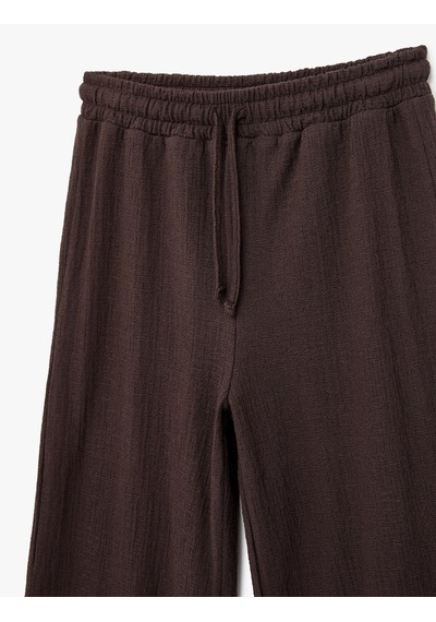 Koton Yüksek Bel Rahat Kalıp Geniş Paça Beli Bağcıklı Pantolon Kahverengi 6sal40021ık Kahve Koton Yüksek Bel Rahat Kalıp Geniş Paça Beli Bağcıklı Pantolon Kahverengi 6sal40021ık Kahve