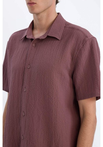 DeFacto Regular Fit Polo Yaka Krinkıl Yazlık Kısa Kollu Gömlek E1223AX25SMBN375 DeFacto Regular Fit Polo Yaka Krinkıl Yazlık Kısa Kollu Gömlek E1223AX25SMBN375