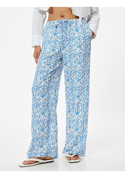 Koton Bol Paça Pantolon Yüksek Bel Bağlama Detaylı Floral Desenli Rahat Kalıp Mavi Desenli 4sak40219ew Mavi