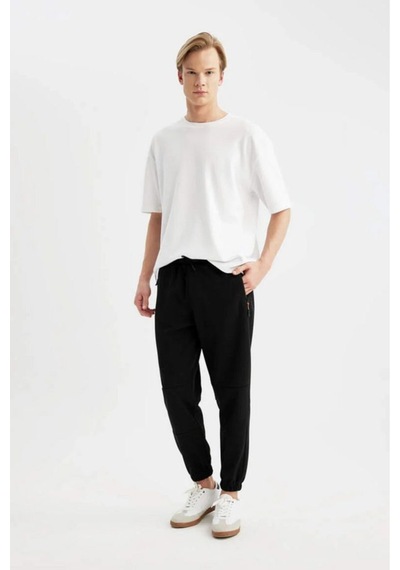 Defacto - Regular Fit Beli Bağcıklı Cepli Paçası Lastikli Şardonlu Basic Düz Jogger Eşofman Altı E6326AX25AU Siyah