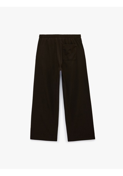Koton Bol Kalıp Viskon Karışımlı Beli Bağcıklı Geniş Paça Pantolon Kahverengi 6sam40120hw Kahve Koton Bol Kalıp Viskon Karışımlı Beli Bağcıklı Geniş Paça Pantolon Kahverengi 6sam40120hw Kahve