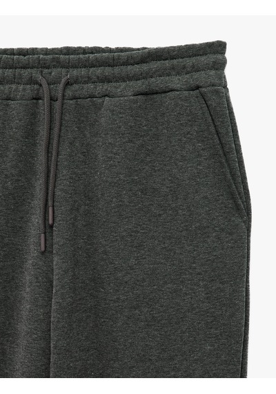 Koton Üç İplik Şardonlu Cepli Beli Bağcıklı Jogger Spor Eşofman Altı Koyu Gri Melanj 7wam40066nk Koton Üç İplik Şardonlu Cepli Beli Bağcıklı Jogger Spor Eşofman Altı Koyu Gri Melanj 7wam40066nk