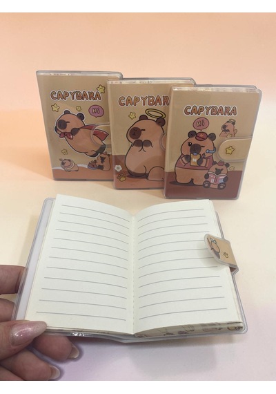Capybara A7 Not Defteri , Çıt Çıtlı Cep Defteri - Kitap Okuyan Capybara Sarı