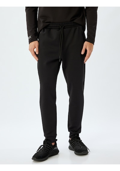 Koton Spor Eşofman Altı Jogger Beli Bağcıklı Fermuarlı Cep Detaylı Siyah 5wam40013nk Siyah Koton Spor Eşofman Altı Jogger Beli Bağcıklı Fermuarlı Cep Detaylı Siyah 5wam40013nk Siyah