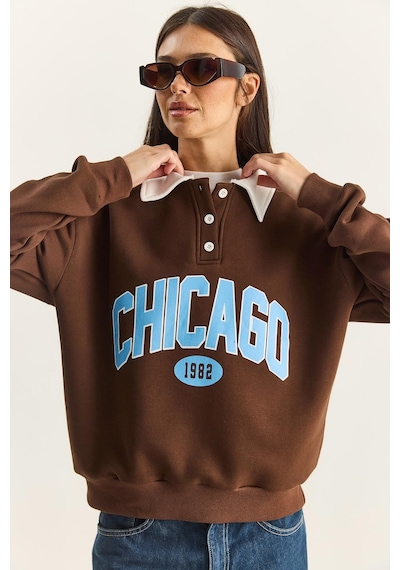 Shade Kadın Polo Yaka Chicago Baskılı Üç İplik Şardonlu Sweatshirt 60601050 - Acı Kahve Çok Renkli Shade Kadın Polo Yaka Chicago Baskılı Üç İplik Şardonlu Sweatshirt 60601050 - Acı Kahve Çok Renkli