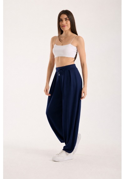 Gugus Kadın Modal Kumaş Şalvar Trend Model Paça Ve Bel Detaylı Rahat Kesim Eşofman Koyu Lacivert Gugus Kadın Modal Kumaş Şalvar Trend Model Paça Ve Bel Detaylı Rahat Kesim Eşofman Koyu Lacivert