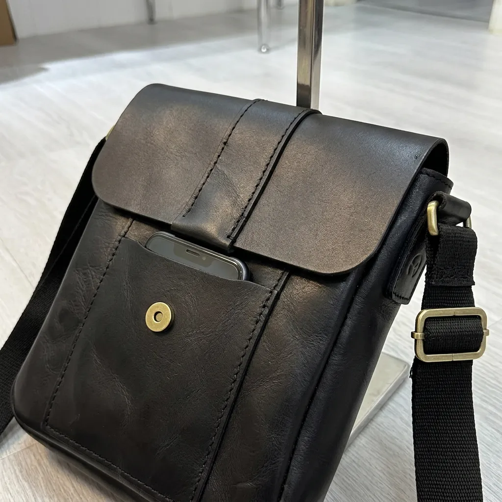 Natderi Unisex Hakiki Deri Siyah & Acı Kahve Seçenekli Postacı Çantası Ayarlanabilir Askılı Çapraz Çanta 24x21 Cm