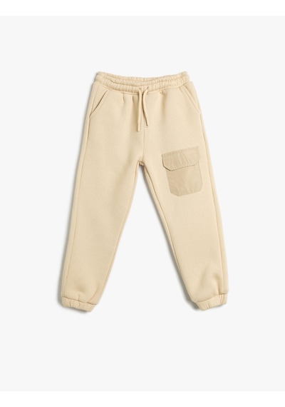 Koton Basic Jogger Eşofman Altı Beli Bağlamalı Cep Detaylı Şardonlu Bej 4wkb40006tk Ekru