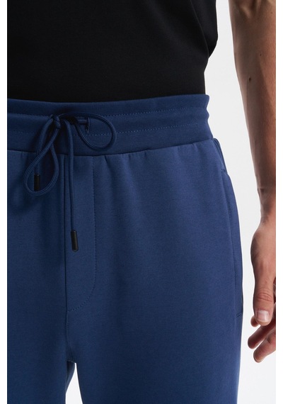 Ar-ma Erkek Slim Fit Örme Interlok Basic Dar Paça Eşofman Altı Arka Ve Yan Fleto Fermuar Cepli Paçalar Ribanalı %80 Pamuk %14 Polyester %6 Elastane K30174998902 İndigo-i1 İndigo Ar-ma Erkek Slim Fit Örme Interlok Basic Dar Paça Eşofman Altı Arka Ve Yan Fleto Fermuar Cepli Paçalar Ribanalı %80 Pamuk %14 Polyester %6 Elastane K30174998902 İndigo-i1 İndigo