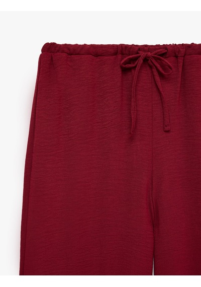 Koton Keten Görünümlü Beli Bağcıklı Cepli Düz Geniş Paça Pantolon Bordo 6sak40385pw