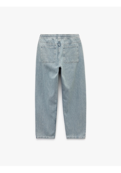 Koton Beli Bağcıklı Cep Detaylı Pamuklu Rahat Kesim Jogger Denim Pantolon İndigo Stone 6wam40082nd İndigo - Taş Koton Beli Bağcıklı Cep Detaylı Pamuklu Rahat Kesim Jogger Denim Pantolon İndigo Stone 6wam40082nd İndigo - Taş