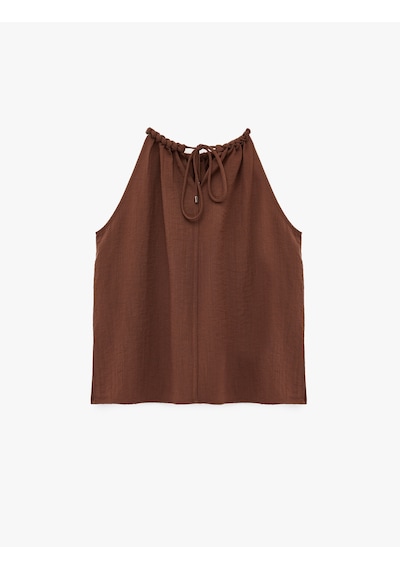 Koton Viskon Rayon Kumaş Kolsuz Büzgülü Halter Yaka Bluz Kahverengi 6sak60292pw Kahve Koton Viskon Rayon Kumaş Kolsuz Büzgülü Halter Yaka Bluz Kahverengi 6sak60292pw Kahve
