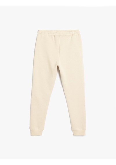 Koton Jogger Eşofman Altı Slogan Baskılı Cepli Beli Bağlamalı Bej 5wkb40175tk Ekru