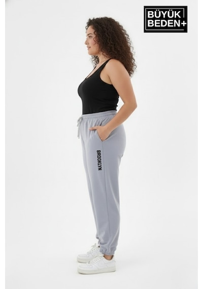 Süperlife Kadın Büyük Beden Brooklyn Baskılı Paça Lastikli Jogger İnce Eşofman Altı Spr26beak951-2 Gri Melanj Süperlife Kadın Büyük Beden Brooklyn Baskılı Paça Lastikli Jogger İnce Eşofman Altı Spr26beak951-2 Gri Melanj