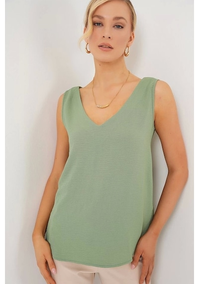 Defymoda V Yaka Sıfır Kol Bluz 950 - Çağla Çağla