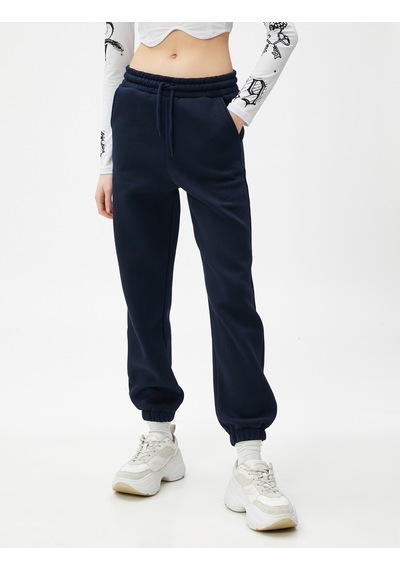 Koton Şardonlu Jogger Eşofman Altı Beli Lastikli Bağcıklı Cep Detaylı Lacivert 4wal40002ık Koton Şardonlu Jogger Eşofman Altı Beli Lastikli Bağcıklı Cep Detaylı Lacivert 4wal40002ık